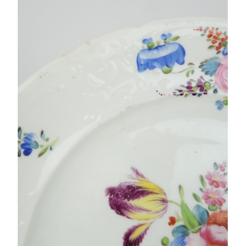 374 - A PAIR OF MID 19TH CENTURY PLATESpossibly Swansea, each with painted floral decoration and a further... 