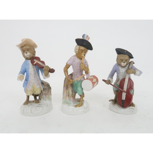 377 - FIVE CONTINENTAL MONKEY BAND FIGURESin the style of Meissen including a bagpipe player, a French hor... 