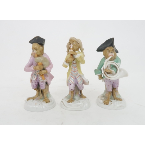 377 - FIVE CONTINENTAL MONKEY BAND FIGURESin the style of Meissen including a bagpipe player, a French hor... 