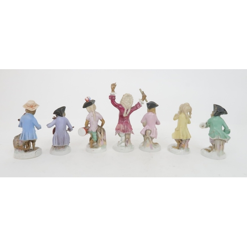 377 - FIVE CONTINENTAL MONKEY BAND FIGURESin the style of Meissen including a bagpipe player, a French hor... 