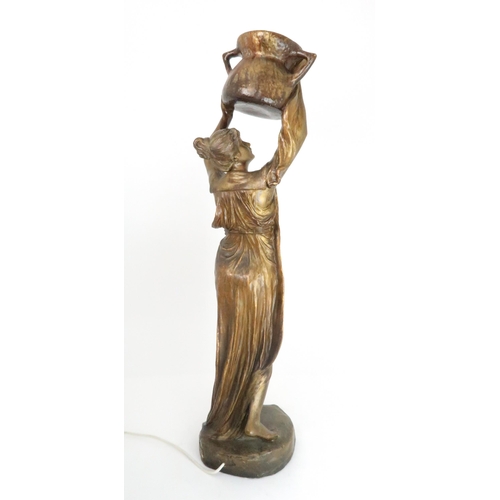 390 - A GOLDSCHEIDER FIGURAL LAMPmodelled as a maiden holding a urn above her head, impressed marks, 84.5c... 