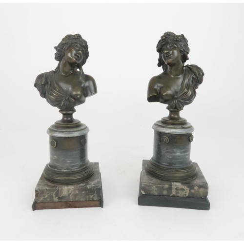 396 - A PAIR OF BRONZE BUSTS OF BUCCANTEmodelled on circular marble plinths and stepped base, 30cm high... 