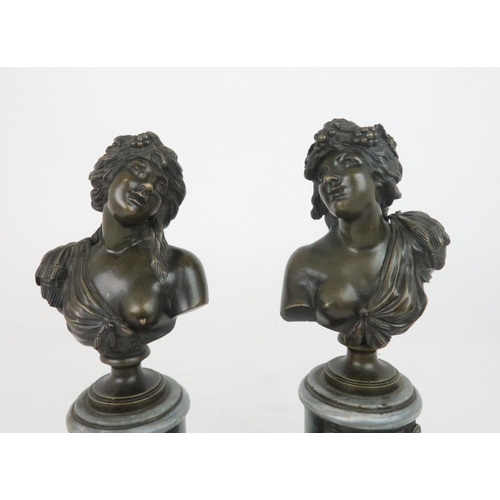 396 - A PAIR OF BRONZE BUSTS OF BUCCANTEmodelled on circular marble plinths and stepped base, 30cm high... 