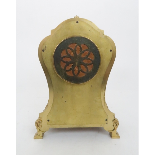 399 - A FRENCH GILT METAL VERNIS MARTIN STYLE MANTLE CLOCKdecorated with a classical garden scene, the mov... 