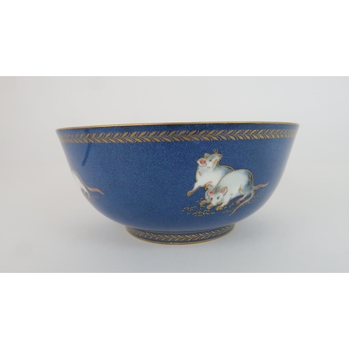 401 - A WEDGWOOD FAIRYLAND LUSTRE BOWLdesigned by James Hodgkiss, the blue ground exterior and white inter... 