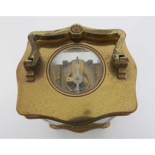 402 - AN EARLY 20TH CENTURY FRENCH BRASS AND CHAMPLEVE ENAMEL CARRIAGE CLOCKthe white dial with arabic num... 