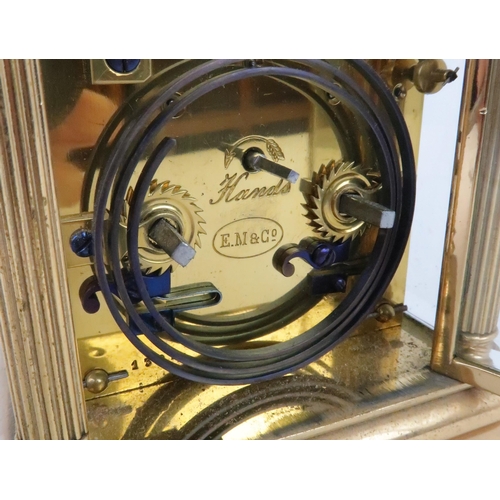 403 - A FRENCH GILT METAL REPEATING CARRIAGE CLOCKwith silvered face and dial with roman numerals, platfor... 