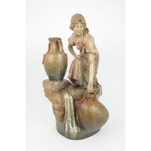 407 - A GOLDSCHEIDER FIGURAL LAMPmodelled as a girl crouching down with urns, 67cm high... 