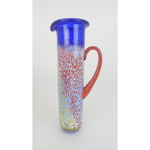 411 - A KJELL ENGMAN (b. 1946) FOR KOSTA BODA HELIOPORA SERIES PITCHERthe blue glass with mottled orange a... 