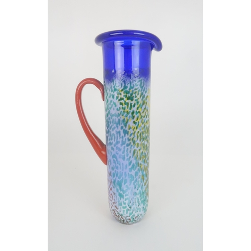 411 - A KJELL ENGMAN (b. 1946) FOR KOSTA BODA HELIOPORA SERIES PITCHERthe blue glass with mottled orange a... 