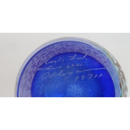 411 - A KJELL ENGMAN (b. 1946) FOR KOSTA BODA HELIOPORA SERIES PITCHERthe blue glass with mottled orange a... 