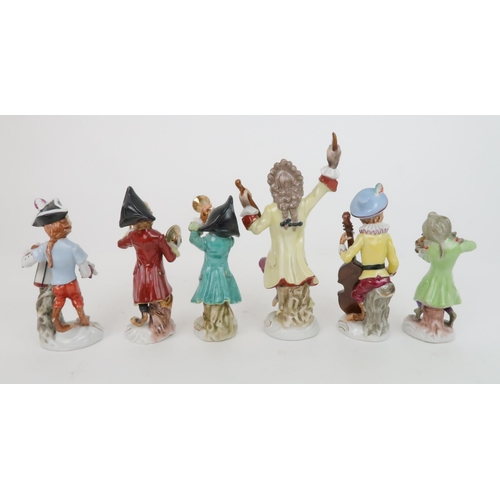 421 - A SET OF SIX CONTINENTAL MONKEY BAND FIGURES tallest 21cm high