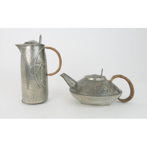 423 - ARCHIBALD KNOX (1864-1933) FOR LIBERTY & CO ENGLISH PEWTER FOUR PIECE TEA SET ON TRAYcomprising ... 