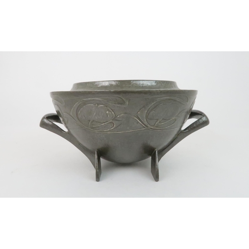 424 - ARCHIBALD KNOX (1864-1933) FOR LIBERTY & CO ROSE BOWLthe hammered body with repousse scrolling d... 