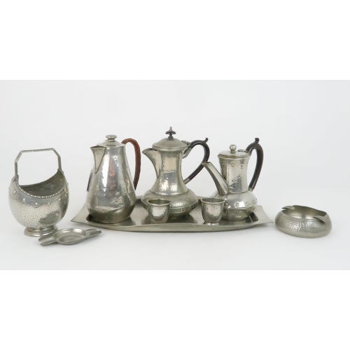 425 - A COLLECTION OF SCOTTISH SCHOOL ARTS AND CRAFTS PEWTER WAREcomprising a foliate charger with central... 