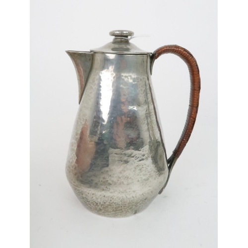 425 - A COLLECTION OF SCOTTISH SCHOOL ARTS AND CRAFTS PEWTER WAREcomprising a foliate charger with central... 