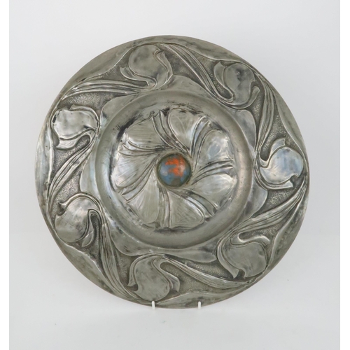 425 - A COLLECTION OF SCOTTISH SCHOOL ARTS AND CRAFTS PEWTER WAREcomprising a foliate charger with central... 