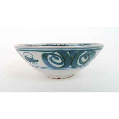 430 - ALAN CAIGER-SMITH (1930-2020) A BOWLpainted in blue, green and red glazes, monogrammed to base, 23.5... 