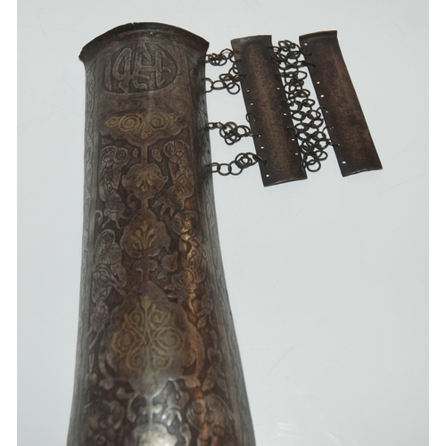 552 - A MIDDLE-EASTERN IRON ARM GUARD BAZU BAND decorated with figures, with wrist guard, 32cm long... 