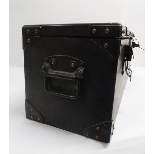 556 - *WITHDRAWN* A CIRCA 1930S METAL GUN BOX by made for Eric Anthony Sykes, the lid decorated with a pan... 