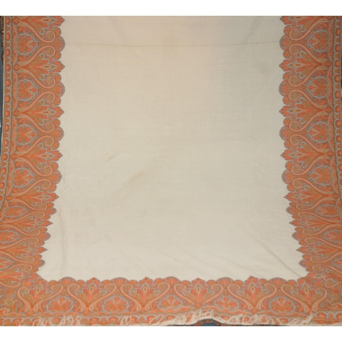 557 - A VICTORIAN WHITE GROUND PAISLEY SHAWL250 x 155cm