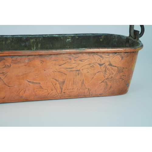 559 - A LARGE COPPER FISH KETTLEpossibly French decorated with a landscape scene and stamped B, with swing... 