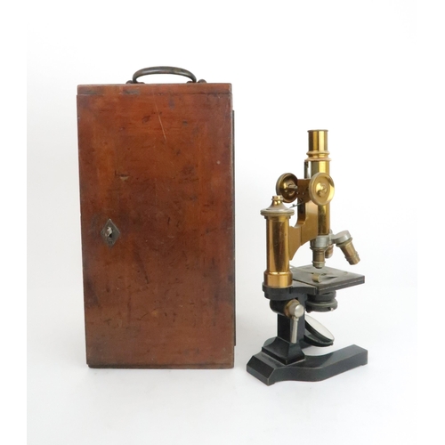 561 - A LAQUERED BRASS MICROSCOPE by E. Leitz Wetzlar, No.40749 and further inscribed R Kanthack, London i... 