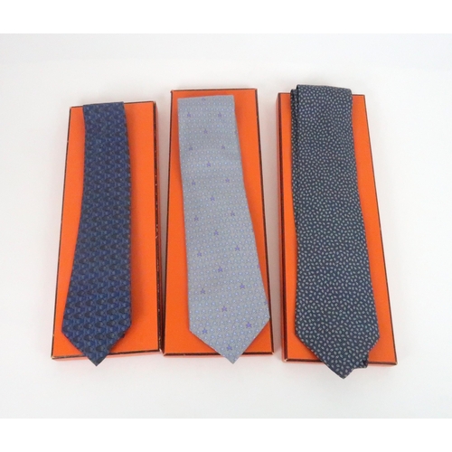 570 - THREE HERMES SILK TIESin original boxes and three Paul Smith ties in original sleeves (6)... 