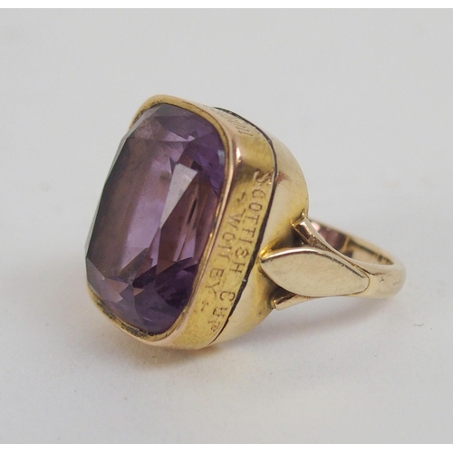 593 - *WITHDRAWN*A 15ct GOLD AND AMETHYST GENTS RINGconverted from watch fob, the side of the ring inscrib... 