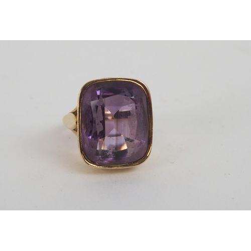 593 - *WITHDRAWN*A 15ct GOLD AND AMETHYST GENTS RINGconverted from watch fob, the side of the ring inscrib... 