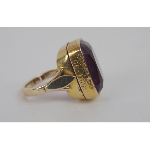 593 - *WITHDRAWN*A 15ct GOLD AND AMETHYST GENTS RINGconverted from watch fob, the side of the ring inscrib... 