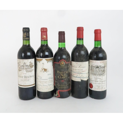 600 - FIVE BOTTLES OF RED WINEcomprising chateau cissac, 1982, Chateau Mouton Baronne Philippe, 1986, Chat... 