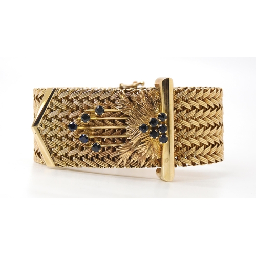 702 - A 9CT SUBSTANTIAL SAPPHIRE RETRO BRACELET the woven herringbone pattern strap, with faux buckle set ... 