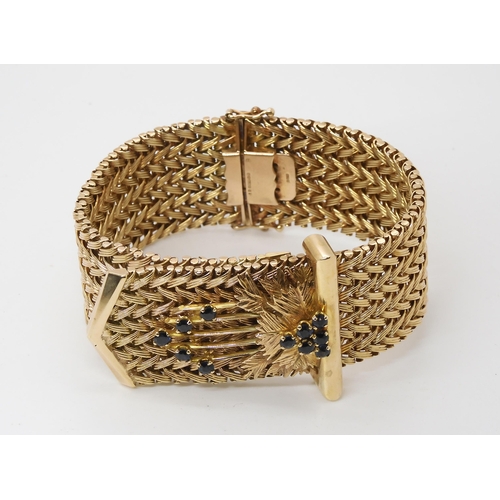 702 - A 9CT SUBSTANTIAL SAPPHIRE RETRO BRACELET the woven herringbone pattern strap, with faux buckle set ... 