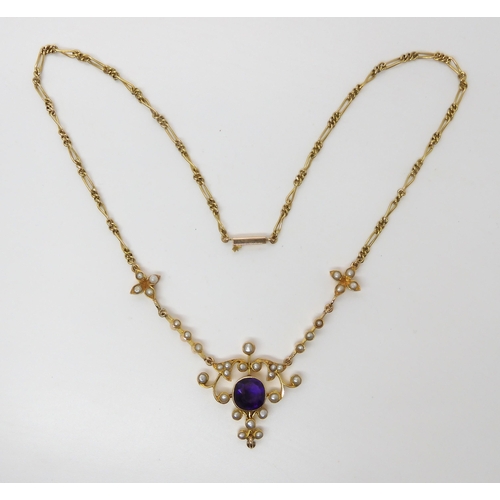 715 - A PEARL AND AMETHYST EDWARDIAN PENDANT NECKLACE made in bright yellow metal with a figaro chain to a... 