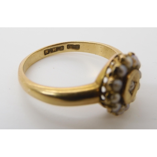 719 - TWO VINTAGE RINGS an 18ct gold pearl and diamond cluster ring, made by Barnet Henry Joseph & Co.... 