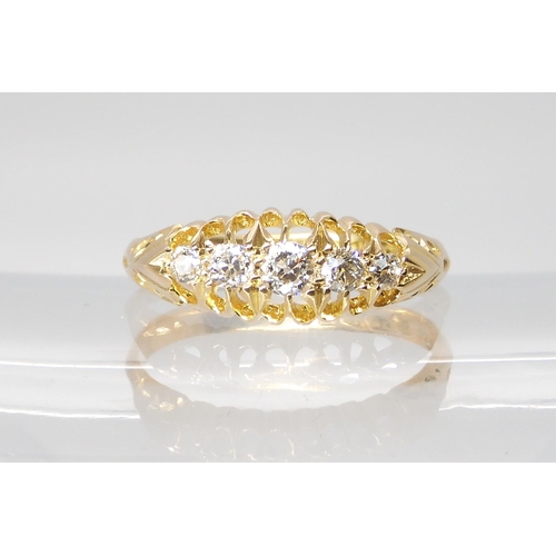 721 - AN 18CT GOLD FIVE STONE DIAMOND RING in classic scroll mount, with full Chester hallmarks for 1904, ... 