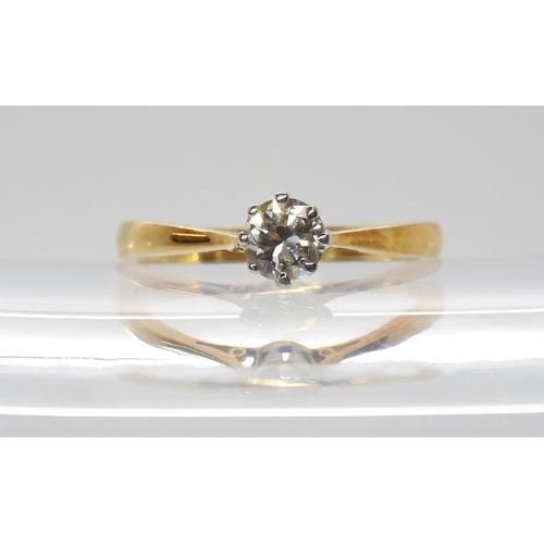 782 - AN 18CT YELLOW AND WHITE GOLD SOLITAIRE DIAMOND RING set with an estimated 0.40ct brilliant cut diam... 