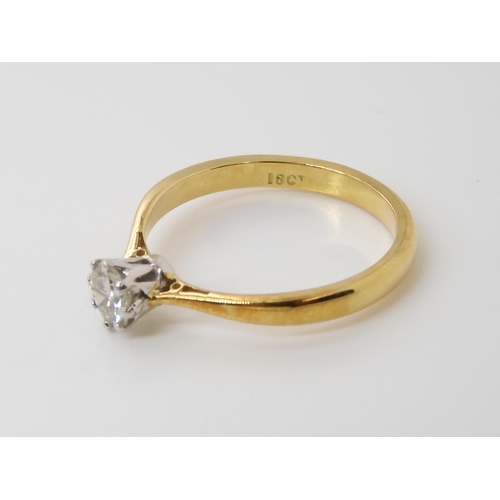 782 - AN 18CT YELLOW AND WHITE GOLD SOLITAIRE DIAMOND RING set with an estimated 0.40ct brilliant cut diam... 