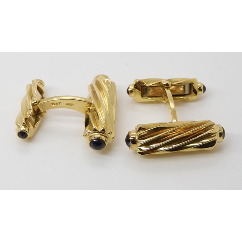 795 - A PAIR OF 18CT GOLD AND SAPPHIRE CUFFLINKSmade by Deakin & Francis, the fluted batons, both ends... 