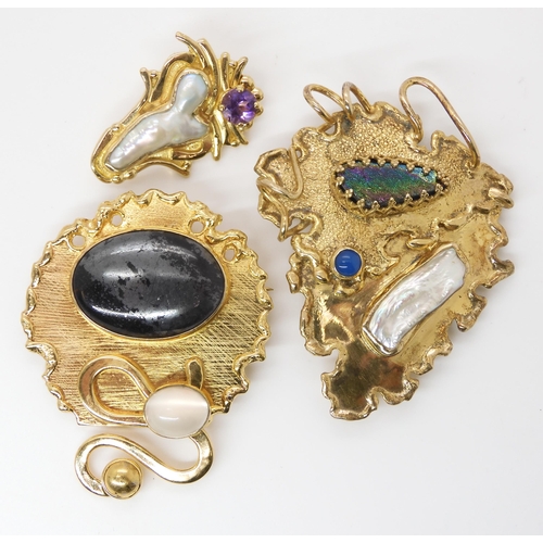 803 - THREE GILDED WHITE METAL GEM SET JEWELSmade by American designer silver smith RMC, featuring hematit... 