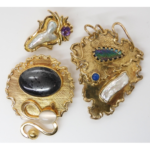 803 - THREE GILDED WHITE METAL GEM SET JEWELSmade by American designer silver smith RMC, featuring hematit... 