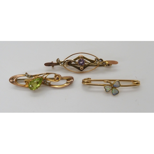 804 - THREE EDWARDIAN JEWELSA 15ct gold opal set shamrock brooch, length 3.5cm, weight 2.1gms. A 9ct gold ... 