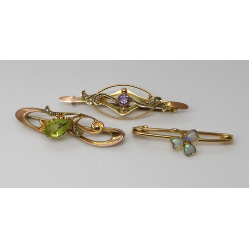 804 - THREE EDWARDIAN JEWELSA 15ct gold opal set shamrock brooch, length 3.5cm, weight 2.1gms. A 9ct gold ... 