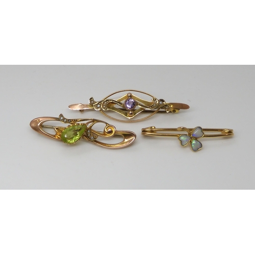 804 - THREE EDWARDIAN JEWELSA 15ct gold opal set shamrock brooch, length 3.5cm, weight 2.1gms. A 9ct gold ... 