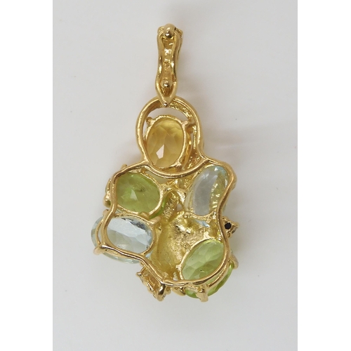 806 - A 14K GOLD GEM SET PENDANTset with peridot, citrine, aquamarine and diamond accents. Length of penda... 