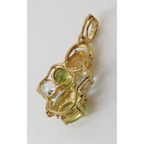 806 - A 14K GOLD GEM SET PENDANTset with peridot, citrine, aquamarine and diamond accents. Length of penda... 