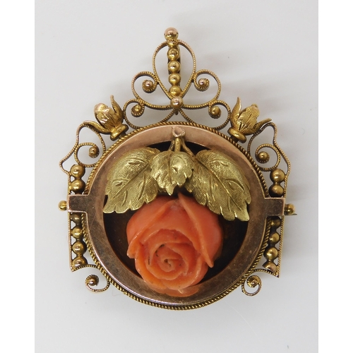 810 - AN ART NOUVEAU PENDANT BROOCHset with a carved coral rose, dimensions 3.6cm x 2.8cm, weight 7.4gms... 