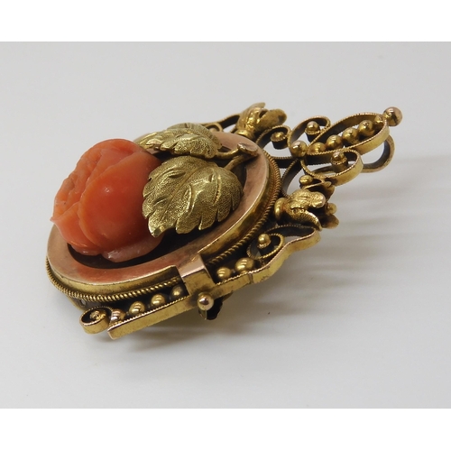 810 - AN ART NOUVEAU PENDANT BROOCHset with a carved coral rose, dimensions 3.6cm x 2.8cm, weight 7.4gms... 