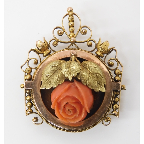 810 - AN ART NOUVEAU PENDANT BROOCHset with a carved coral rose, dimensions 3.6cm x 2.8cm, weight 7.4gms... 